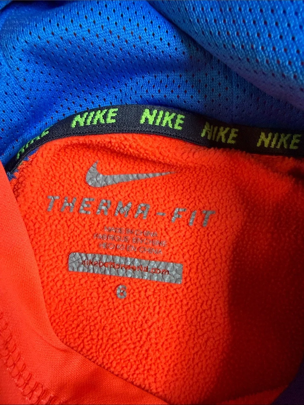 Nike Kids Orange Hoodie with Blue Swoosh and Trim